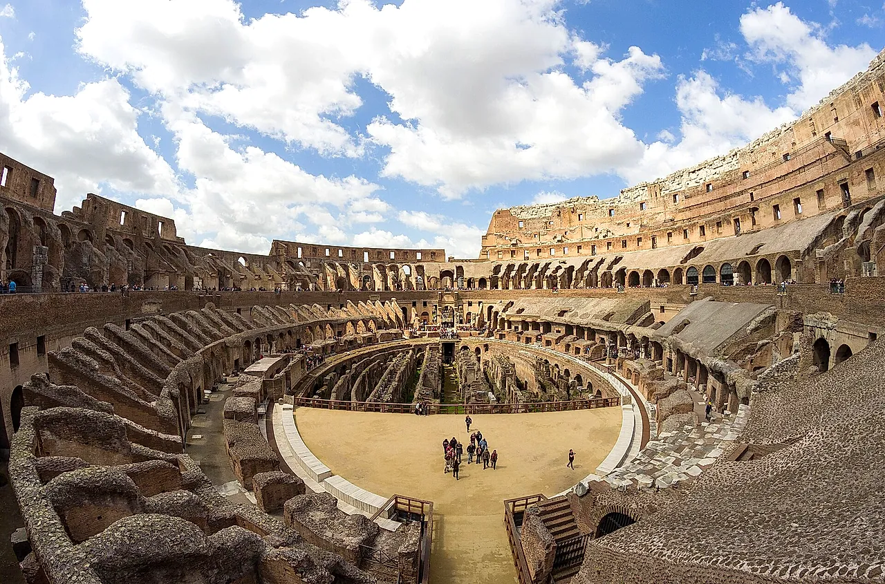 The arena of the Colosseum with the rebuilt floor and the tiers of seating around it