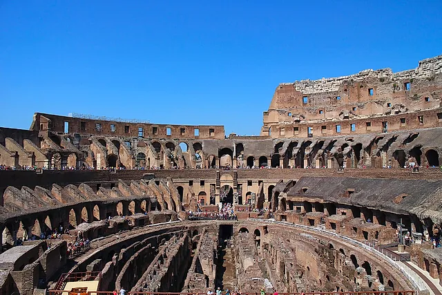 Inside the Colosseum: the tiers of seating, the arena and the exposed corridors below its floor